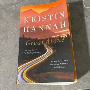 Book. “The Great Alone” by: Kristin Hannah.